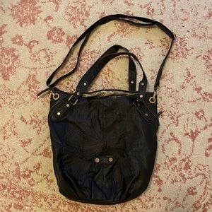Black purse with design on front